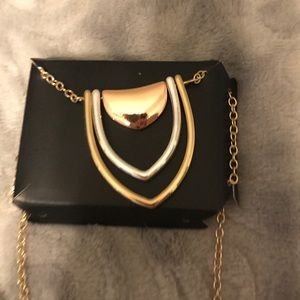 New silver, gold and rose gold toned necklace